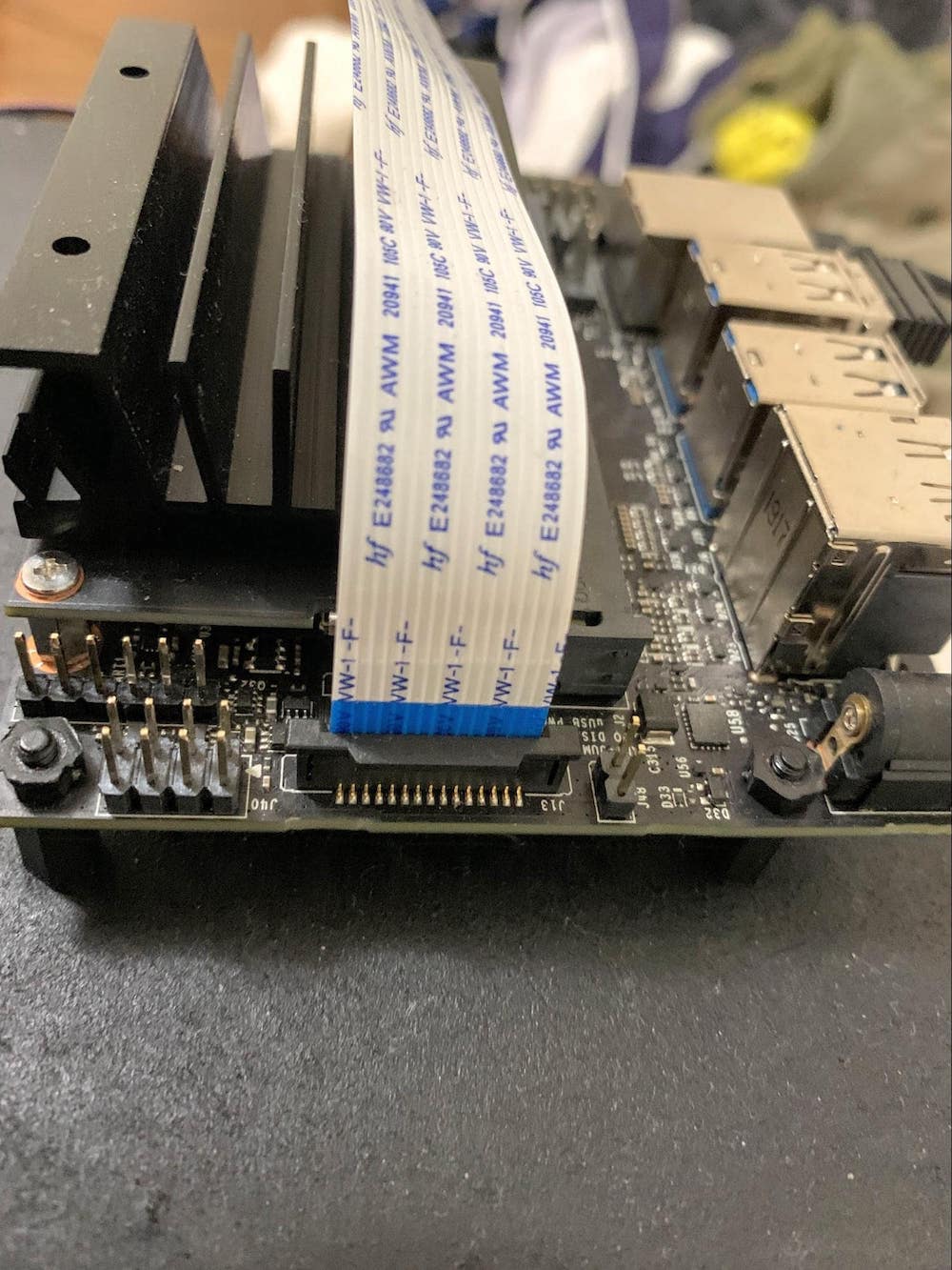 Connecting the camera ribbon cable with the CSI port.